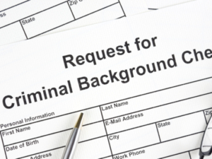 Close up of criminal background check for - new protections from discrimination on erased criminal history